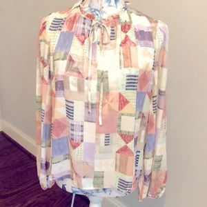 INC NWT blouse with keyhole tie in front.